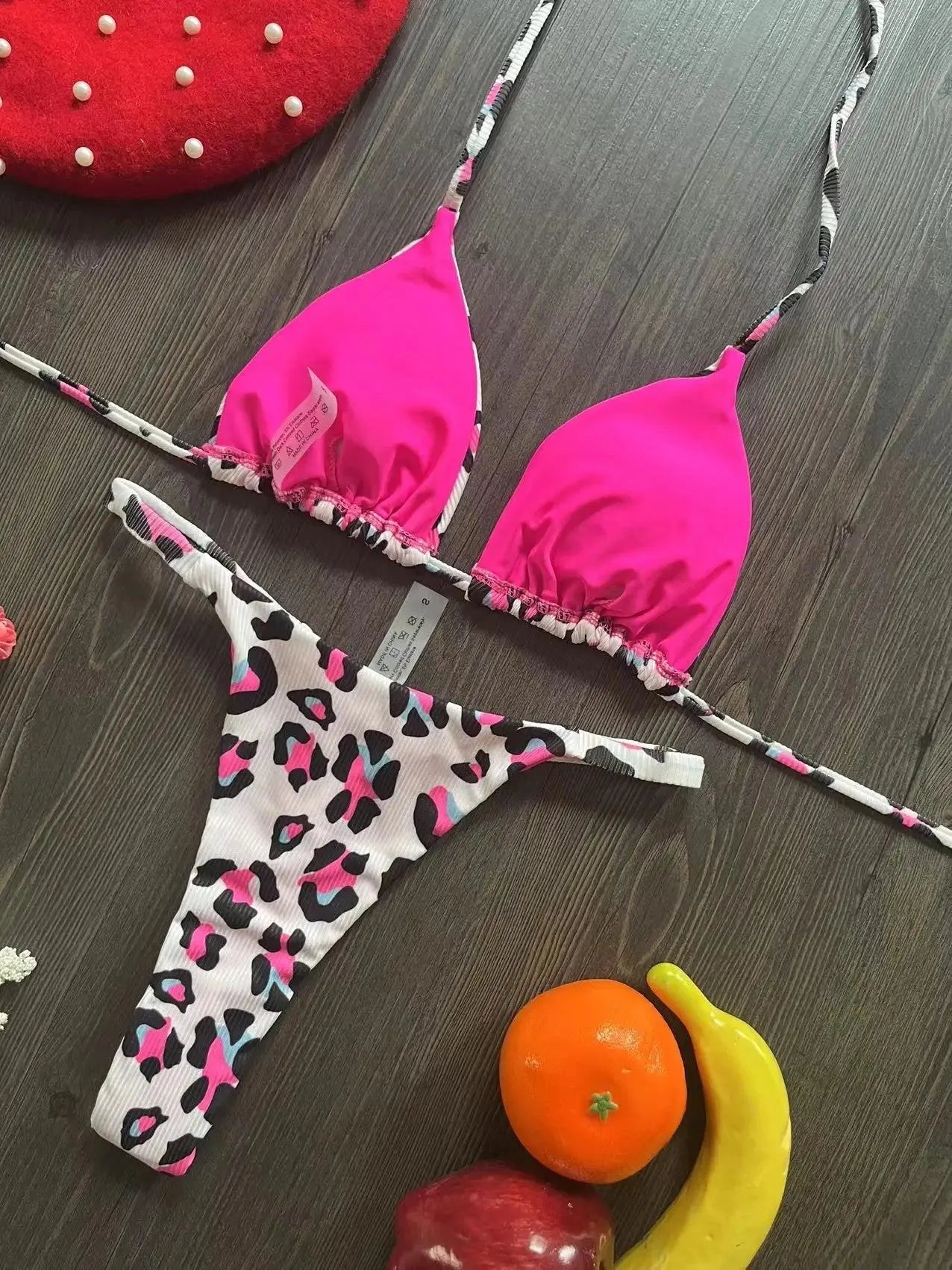 Women's printed bikini swimsuit with briefs style on a neutral background.