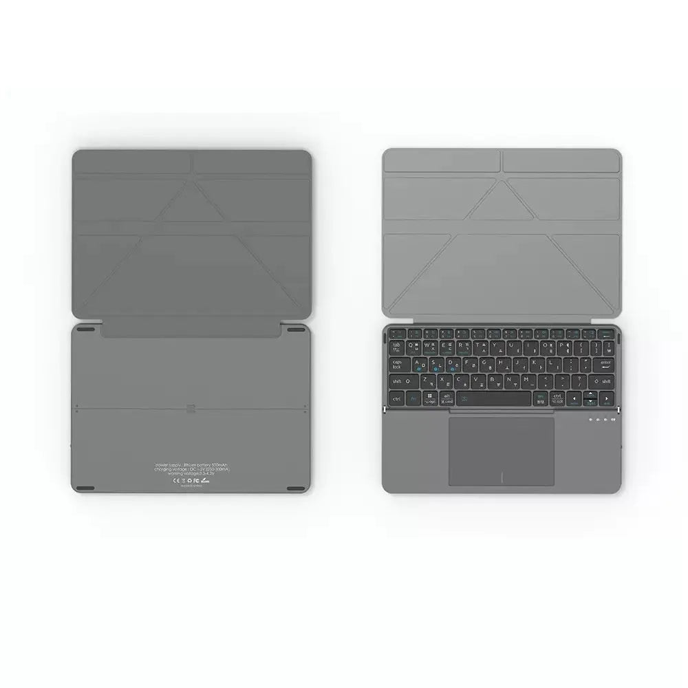Grey wireless Bluetooth folding keyboard for mobile phones and tablets showing compact folded design