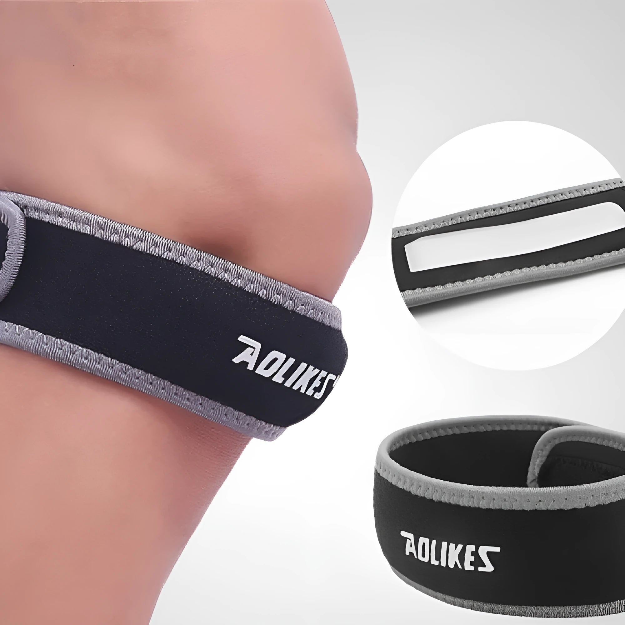 Black and grey patellar retinaculum knee support for running and sports.
