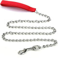 Heavy duty metal dog leash chain with soft black padded handle, shown with red collar attachment.