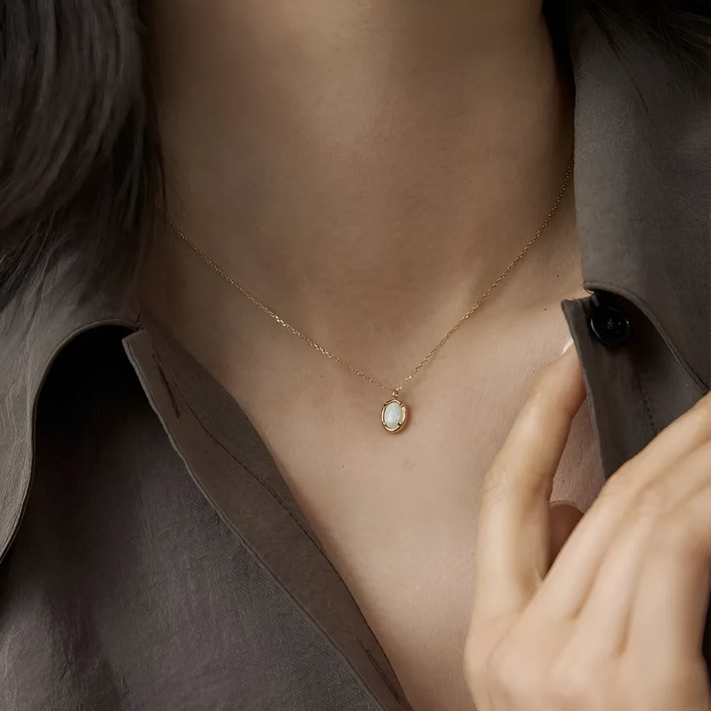 Geometric oval S925 silver pendant necklace with jelly opal gemstone detail