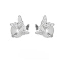Close-up of a pair of silver butterfly stud earrings with a gold-toned finish.