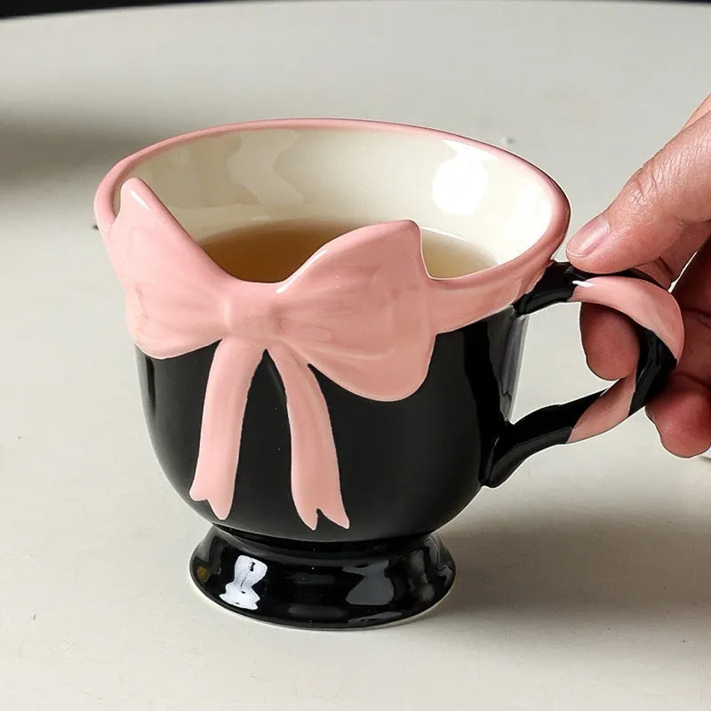 Ceramic mug with girl heart bow design in black pink colour