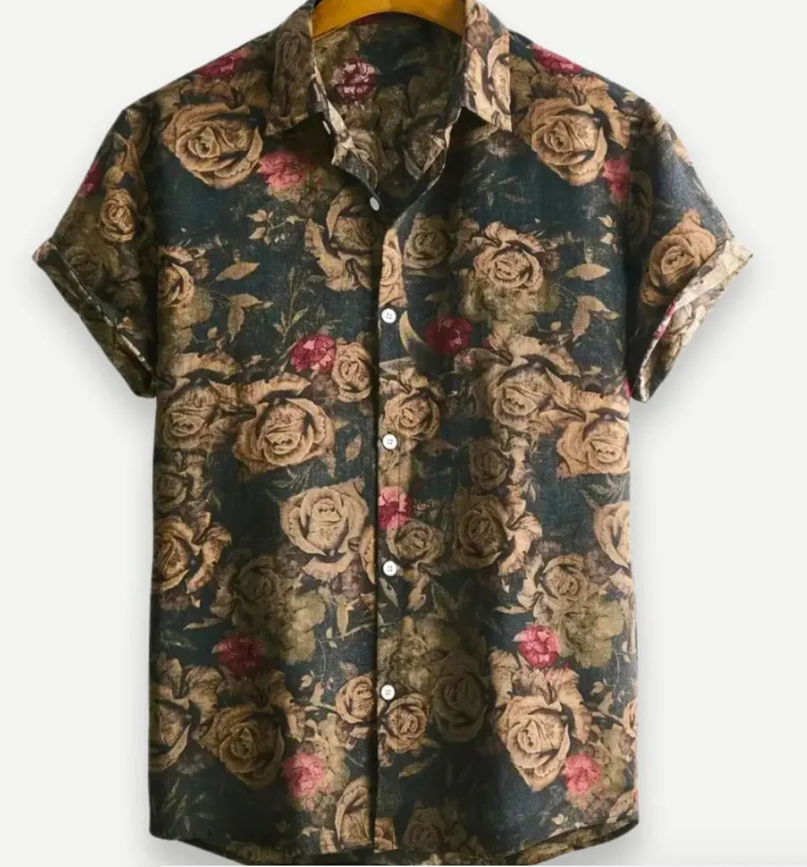 Man wearing a short sleeve floral Hawaiian shirt with lapel collar, made from elastic polyester fabric.