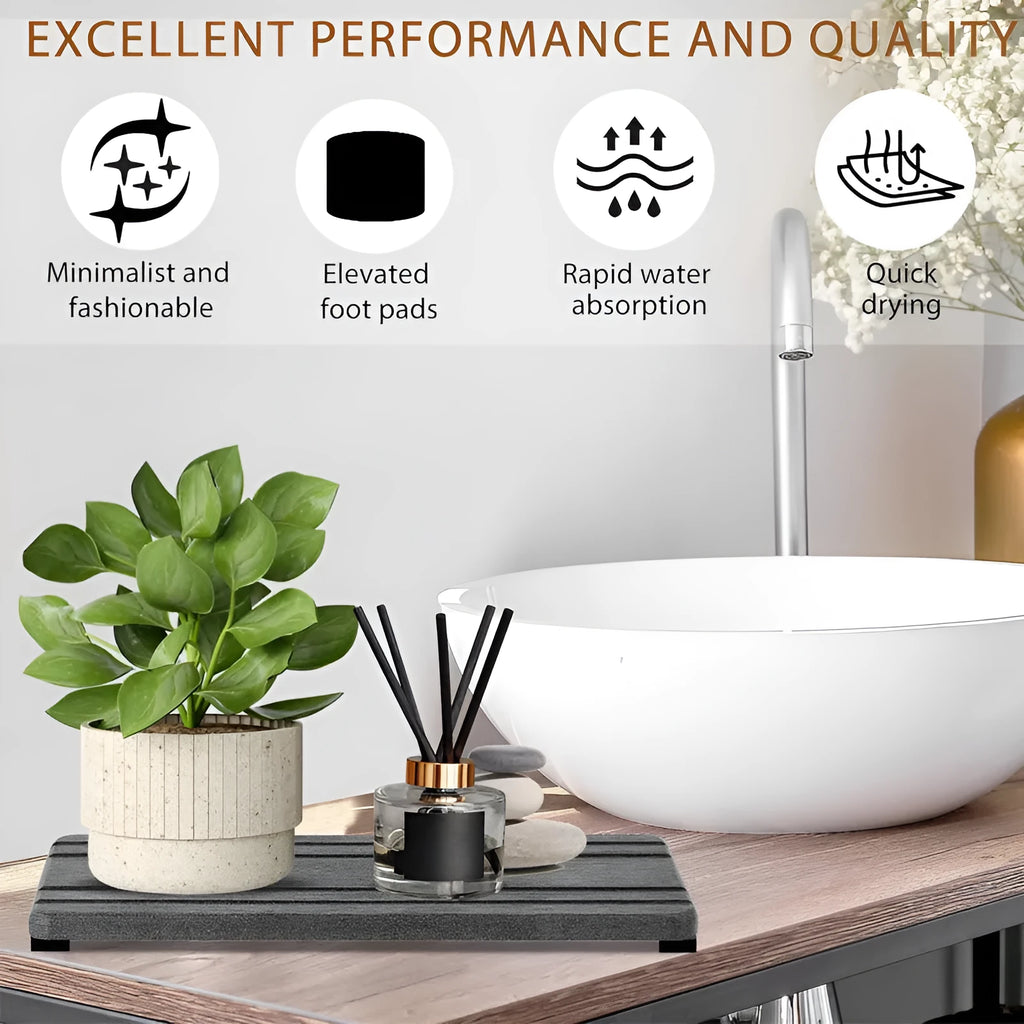 Set of three square diatomite bathroom countertop drying mats in solid grey colour.