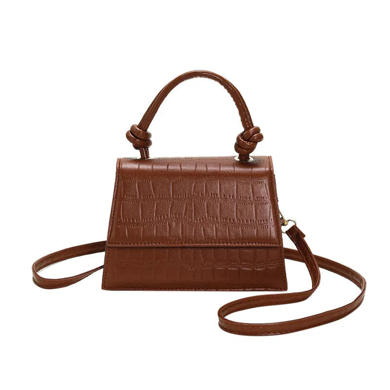 Urban minimalist commuter underarm bag for women, soft PU with stitched seams, horizontal rectangle shape