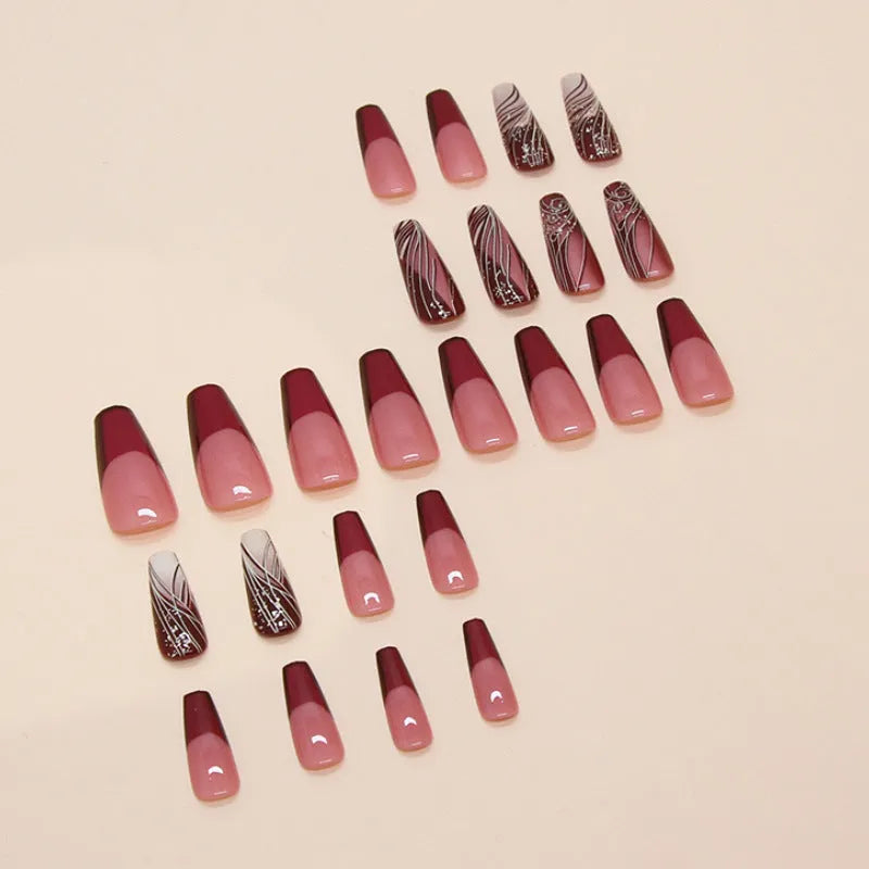 Pack of removable fake nail stickers with a French line design, showing 24 pieces and a tube of glue.
