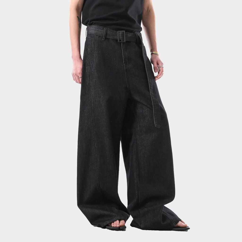 Black high waist straight leg women's jeans with gold detailing on a mannequin.