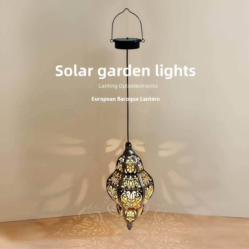 Solar iron hollow lantern chandelier hanging in outdoor courtyard with IP44 waterproof protection