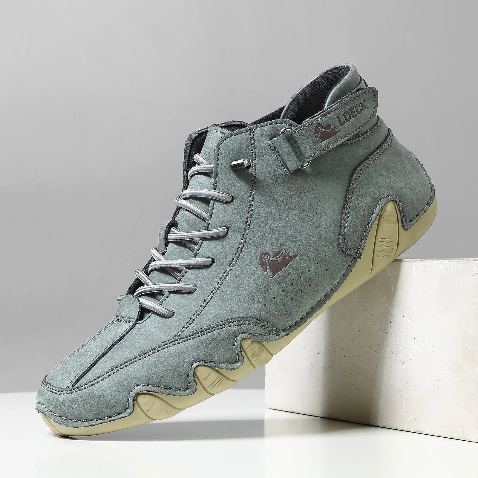 Men's khaki high-top octopus boots with microfiber upper and rubber sole shown on a white background
