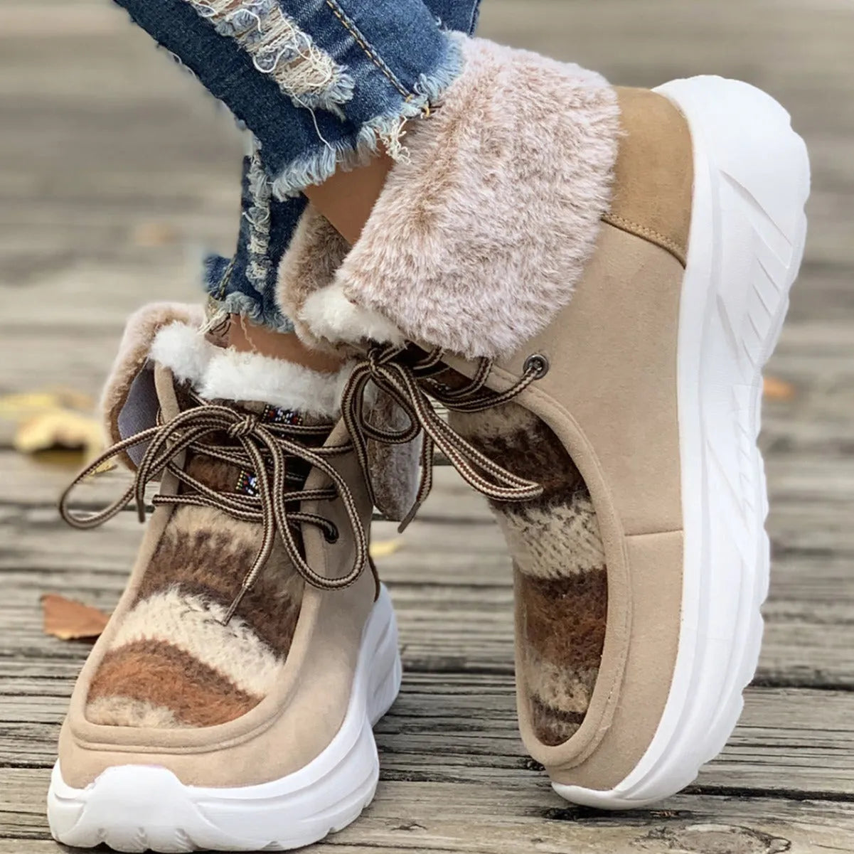 Women's lace-up snow boots with fuzzy suede upper, thermal plush lining, and thick rubber sole in beige colour
