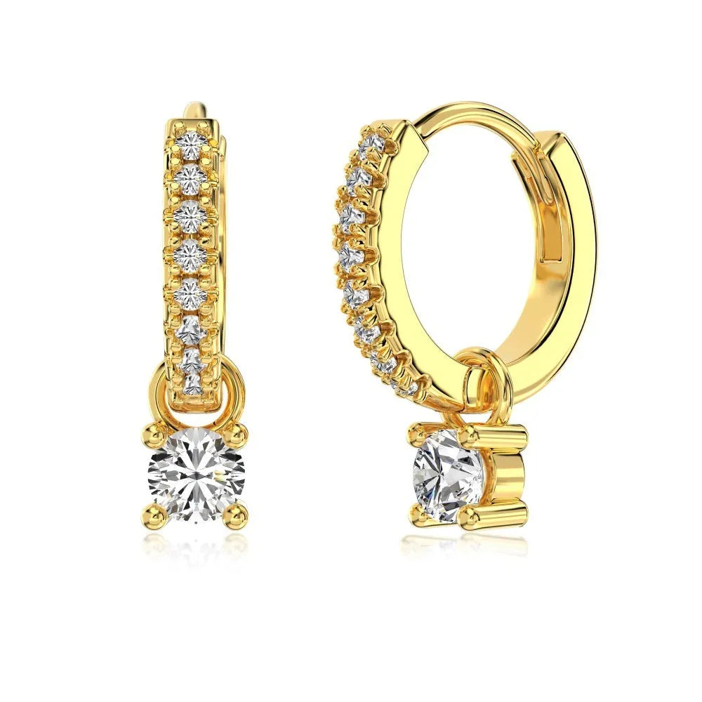 Round zirconium stud earrings in 925 silver with gold electroplated finish on woman