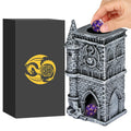 Grey resin castle dice tower gift box set, 17cm by 8cm by 7cm, on a tabletop with dice