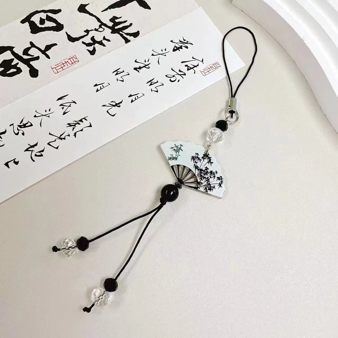 Guofeng Chinese-style floral bead keychain with baked varnish finish in Fan colour design.