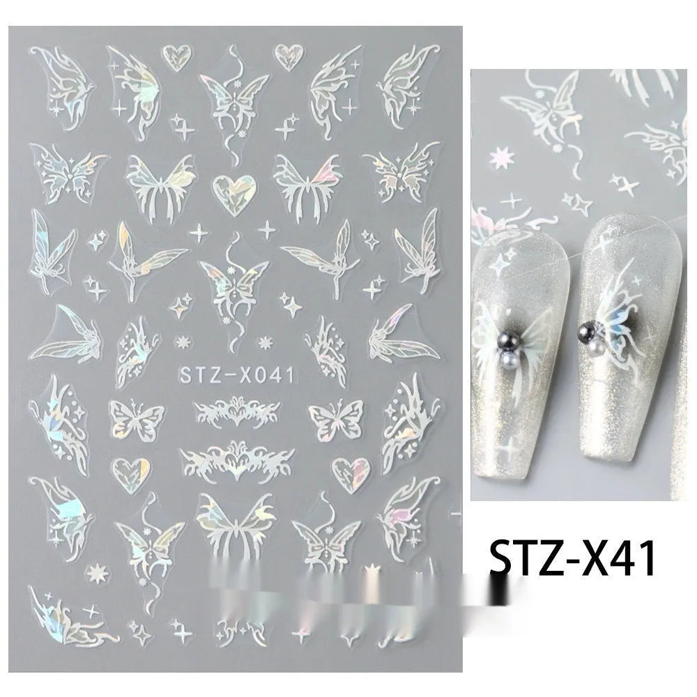 Pack of black and silver striped nail art stickers with cartoon and love pattern designs.