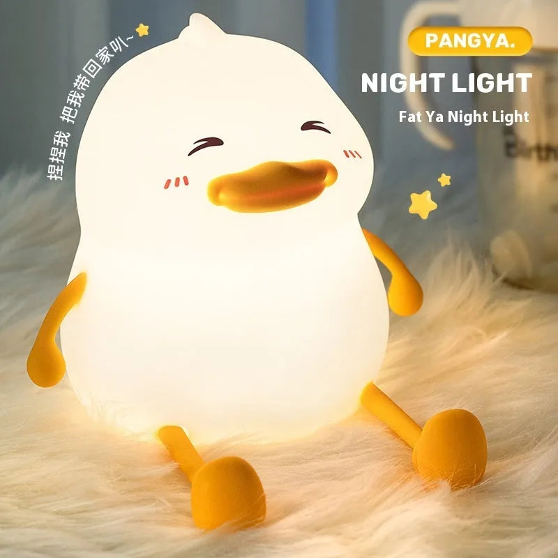 Chubby creative night lamp with phone holder function in silicone and plastic construction