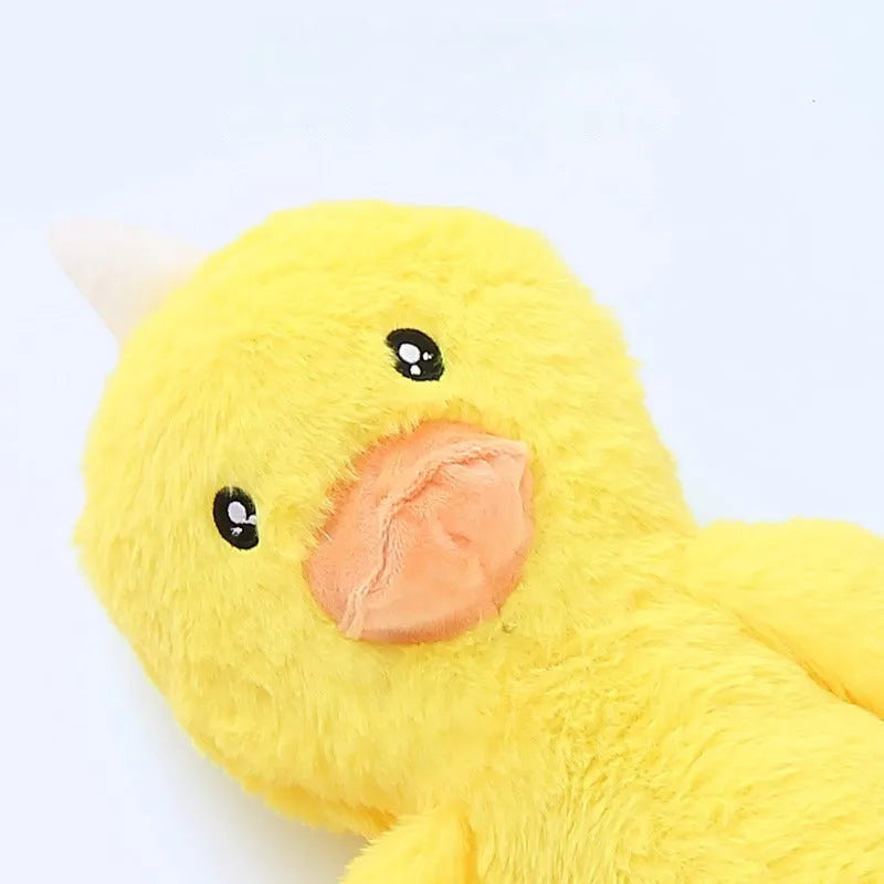Large pink and yellow plush dog toy with paper texture for golden retriever chewing and dental care