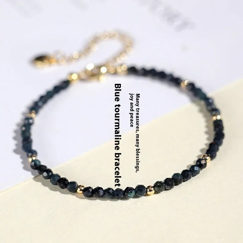 Blue tourmaline beaded bracelet with 3mm stones and silver spacer beads