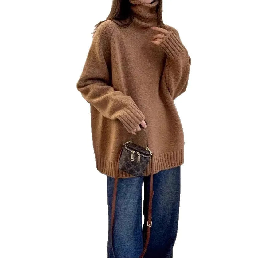 Women's loose grey turtleneck sweater with a thick, textured curling pile collar