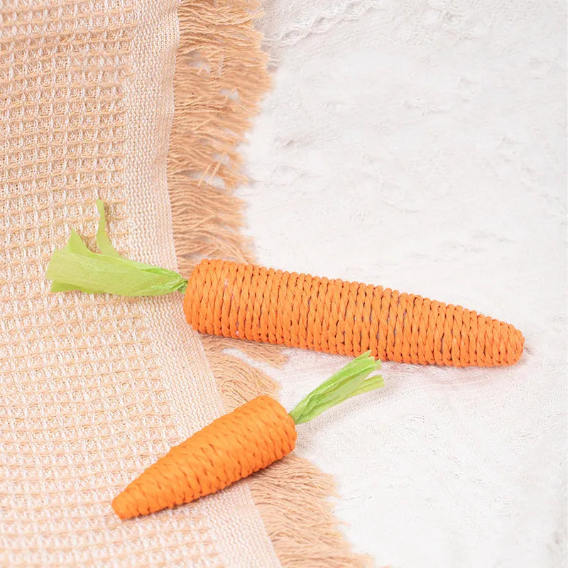 Interactive cat toys set with carrot-shaped paper toys, ringing stones, cat sticks, and dental grinding sticks