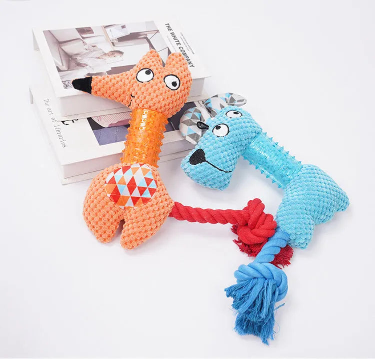 Blue corn kernel TPR dog squeaky toy with cotton rope tail on white background