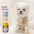 Blue corduroy dog hooded vest with a chessboard grid pattern and traction detailing.
