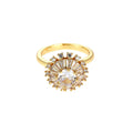 Gold electroplated copper flower ring with open mouth design on a plain background