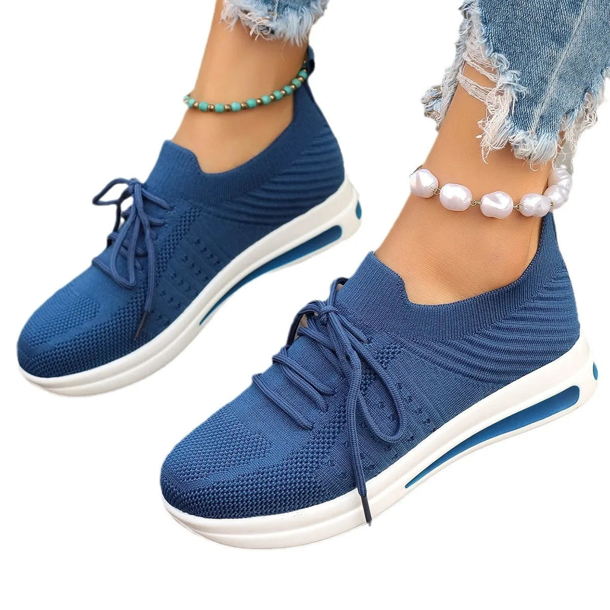 Women's low-top casual sneakers in black, blue, or red with round toe and lace-up front