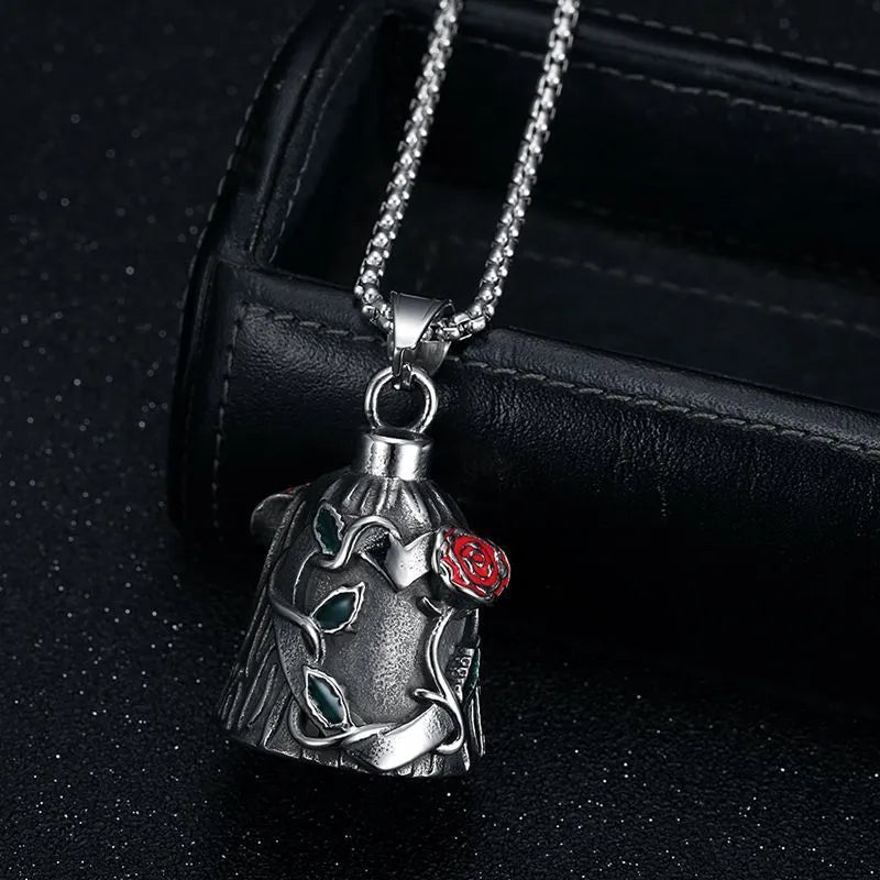 Polished titanium steel motorcycle lucky bell with a double-sided epoxy rose design in retro steel colour.