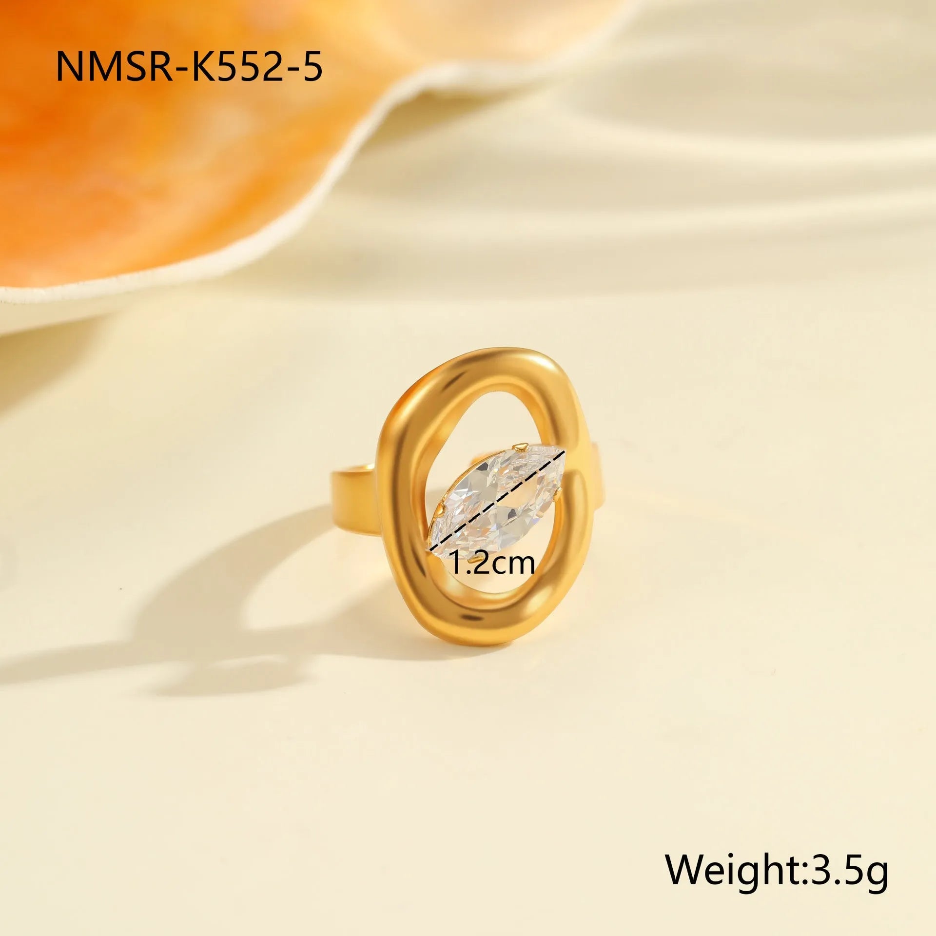 Adjustable geometric stainless steel ring showing open mouth design and colour variations
