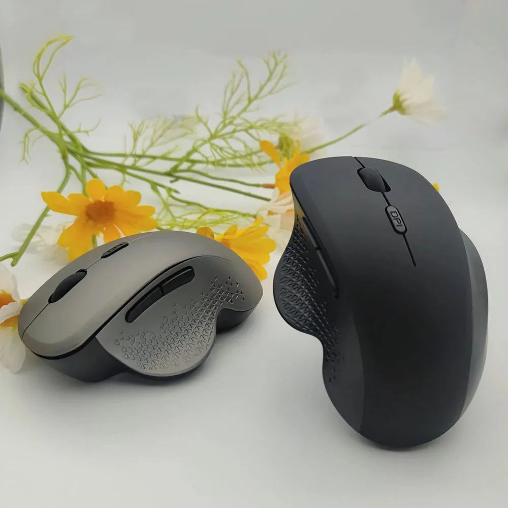 Self-charging wireless laptop mouse in black with 60cm charging cable and USB receiver