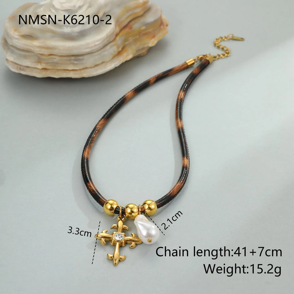 Women's stainless steel necklace with leopard print geometric pendant and gold electroplated finish