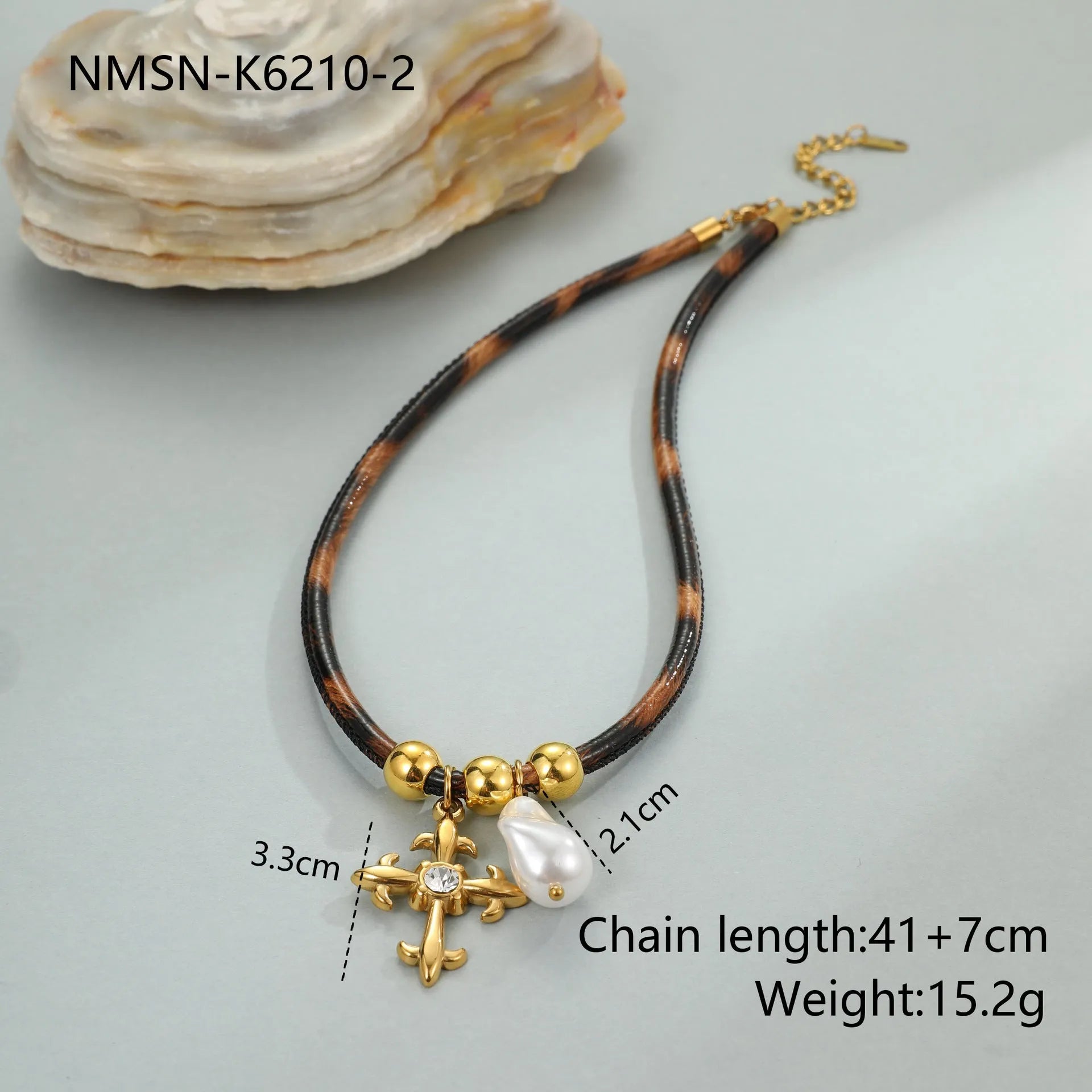 Women's stainless steel necklace with leopard print geometric pendant and gold electroplated finish