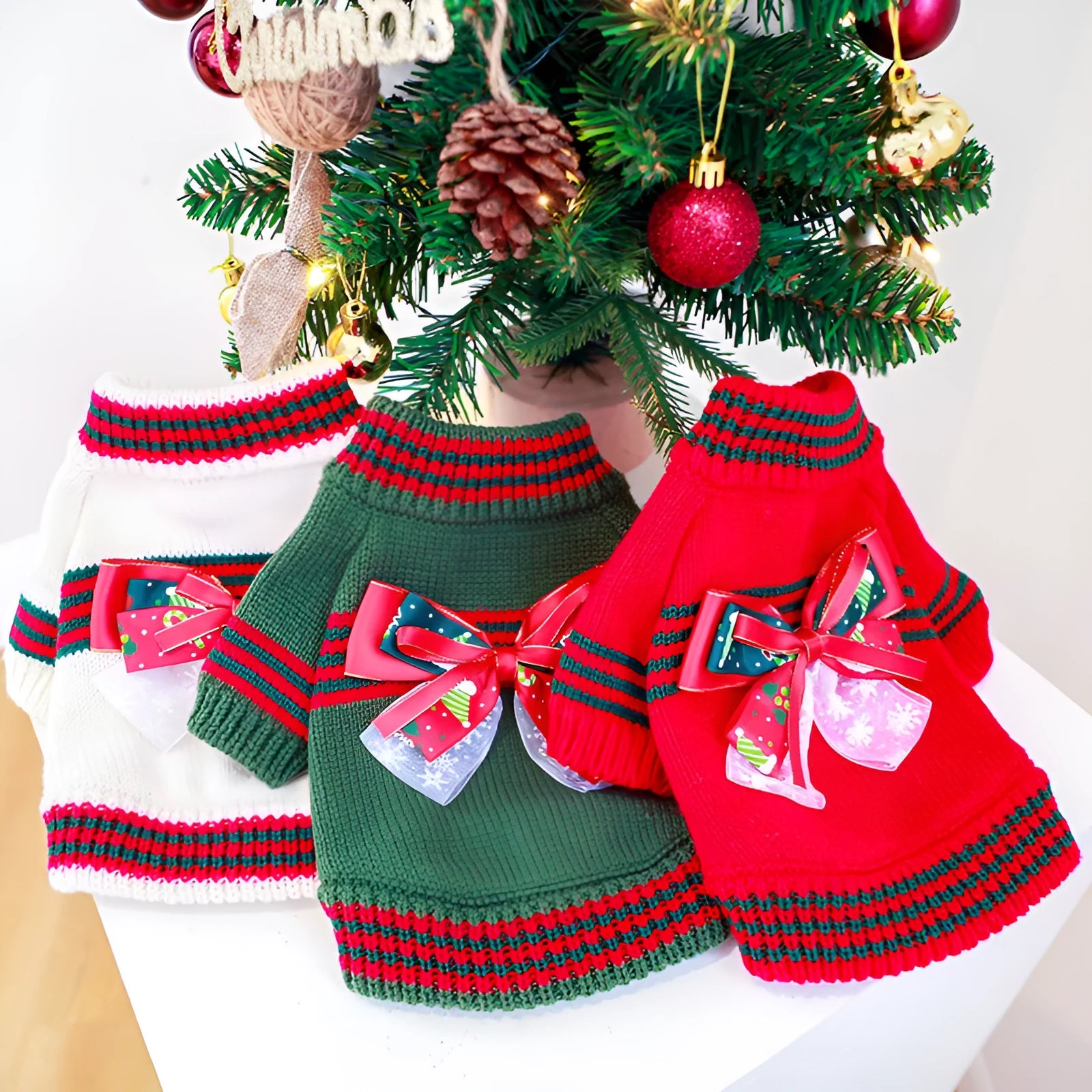 Red or green Christmas-themed polyester sweater for small dogs or cats on a festive background