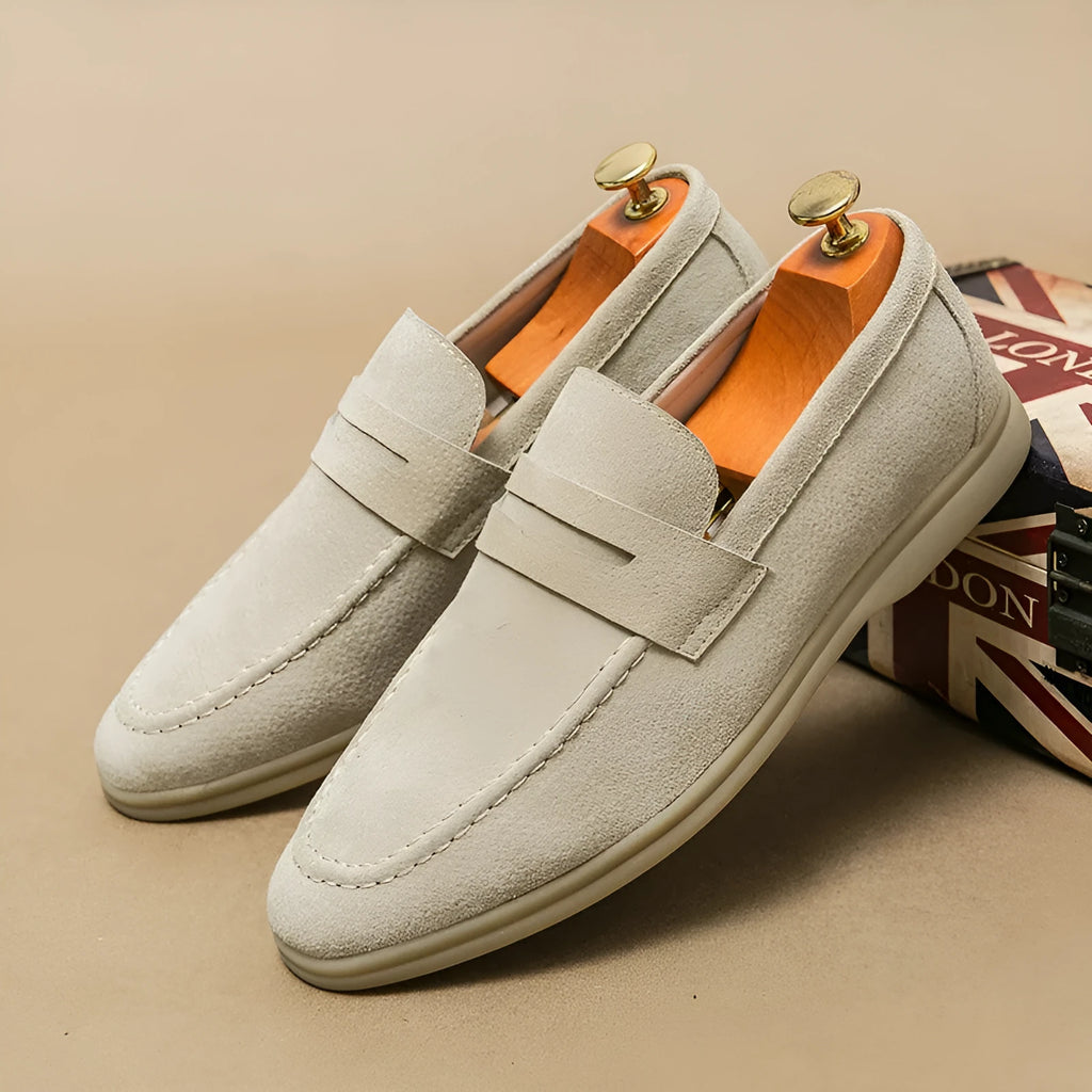 Men's slip-on leather casual shoes in black with mid heel and rubber sole