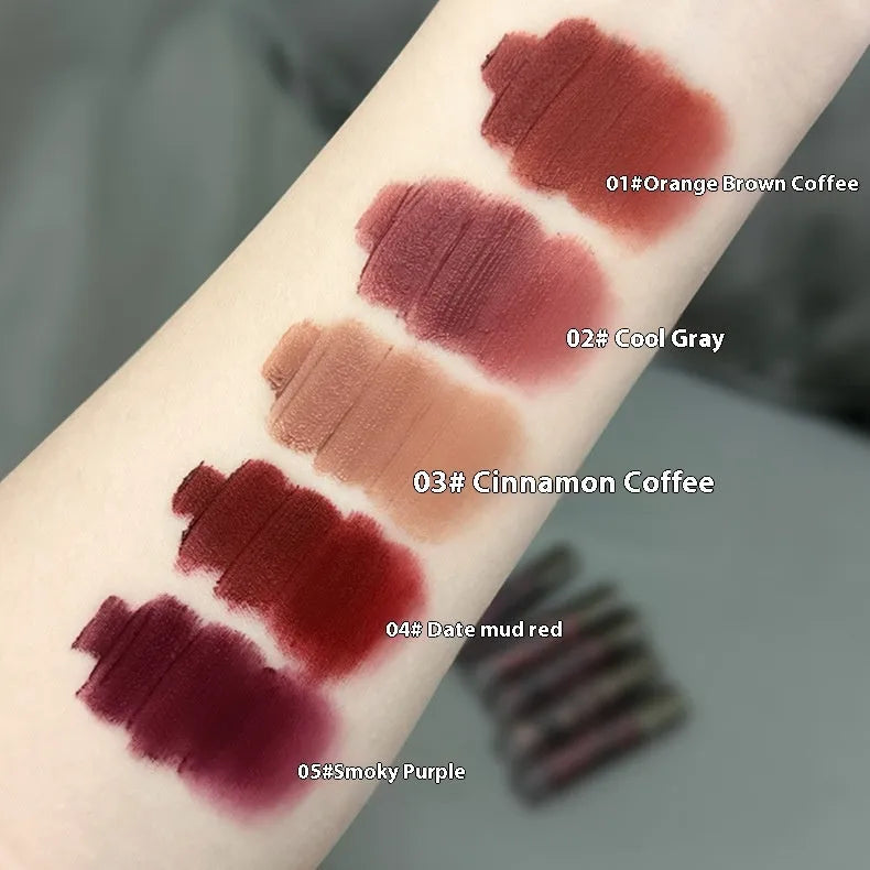 Lava Secret Matte Lip Mud Lipstick tube in one of five colours: Orange Brown Coffee, Cool Gray, Cinnamon Coffee, Jujube Red, or Smoked Purple.