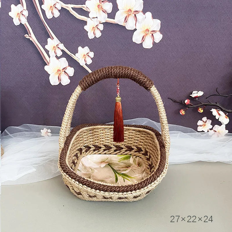 Coffee brown hand-woven hemp rope basket with straw trim, shown from the side.