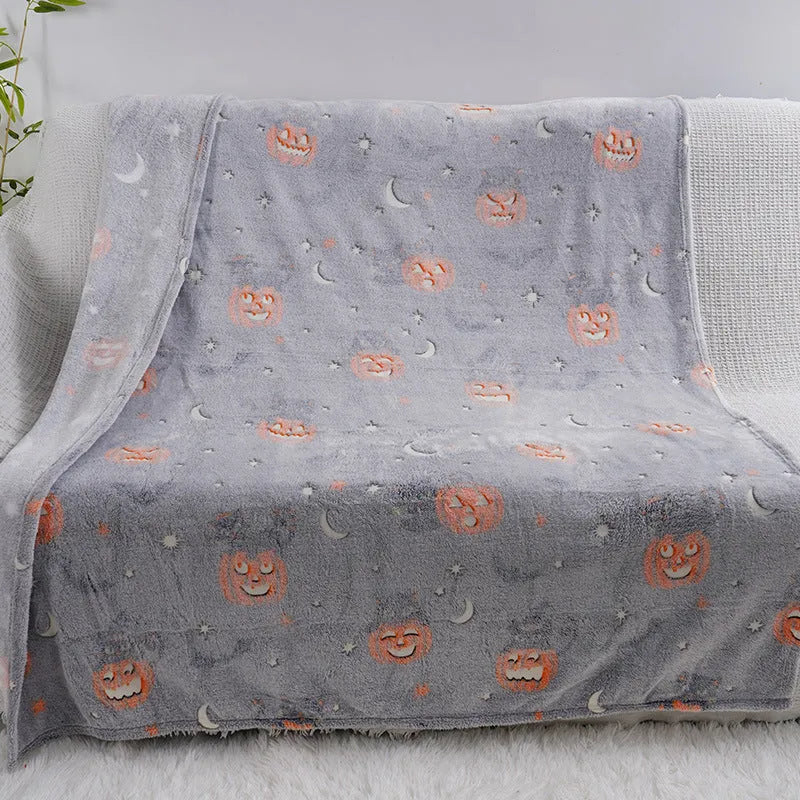 Colourful cartoon print children's flannel blanket, shown in two size options.