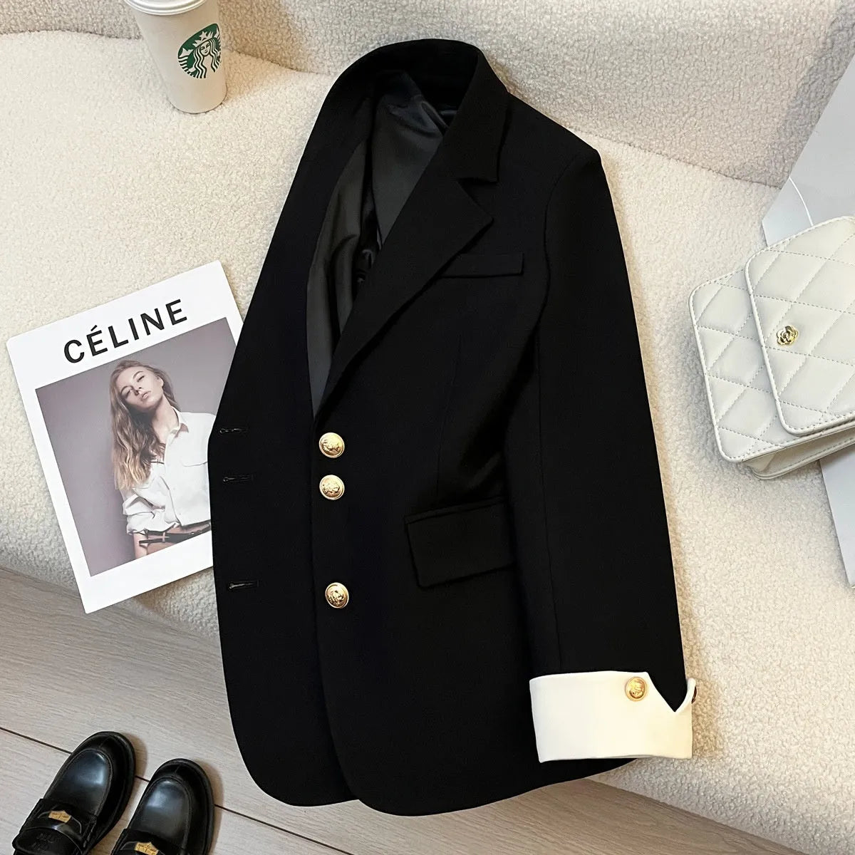 Korean-style loose-fit women's coat in beige and black, showing long sleeves and pockets.