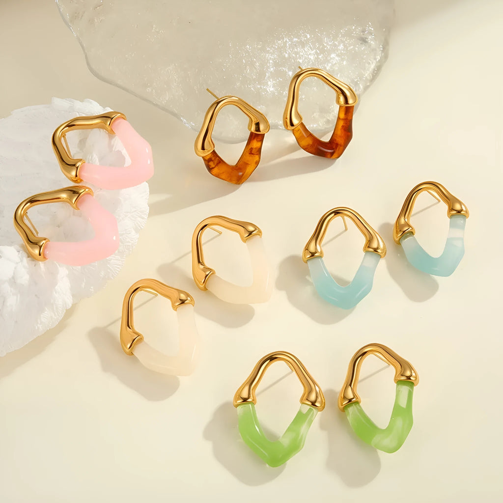 Stainless steel earrings with pink resin stitching and 18K gold plating