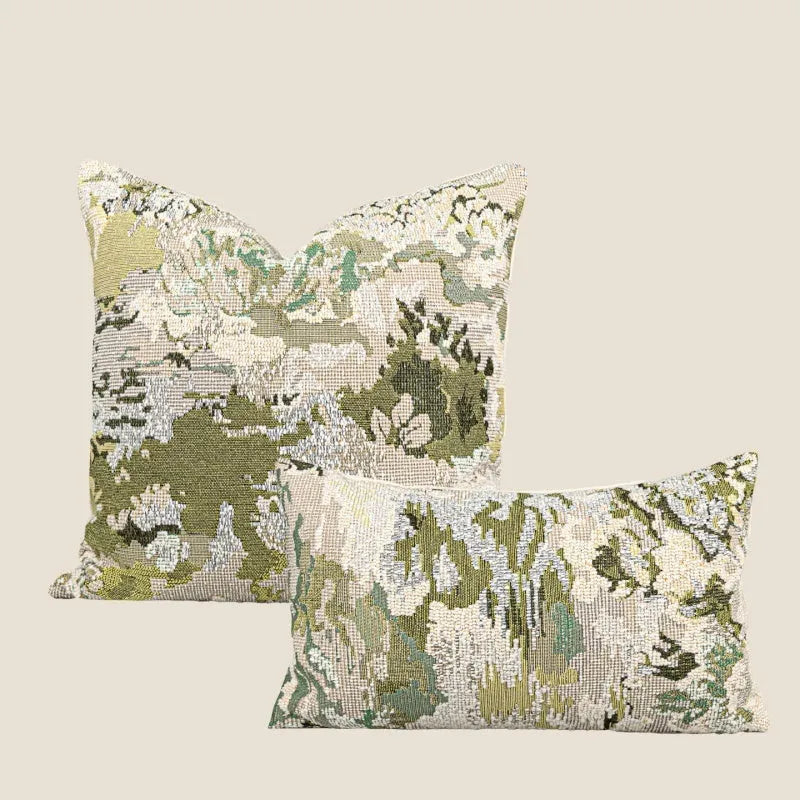 Green abstract floral pattern on a wool blend cushion cover, shown in square and lumbar pillow sizes.