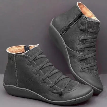 Women's flat casual booties with wedge heel and round toe in multiple colour options