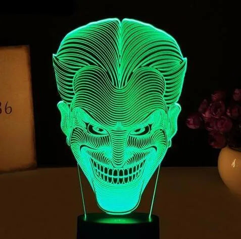 USB-powered 3D acrylic LED table lamp showing multiple colour options and remote control.