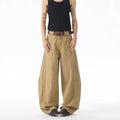Brown men's loose fit straight leg denim jeans with a button fly, shown laid flat.