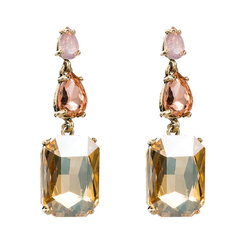 Pair of minimalist rhinestone geometric earrings in round shape, available in purple, green, or brown, European American fashion style.