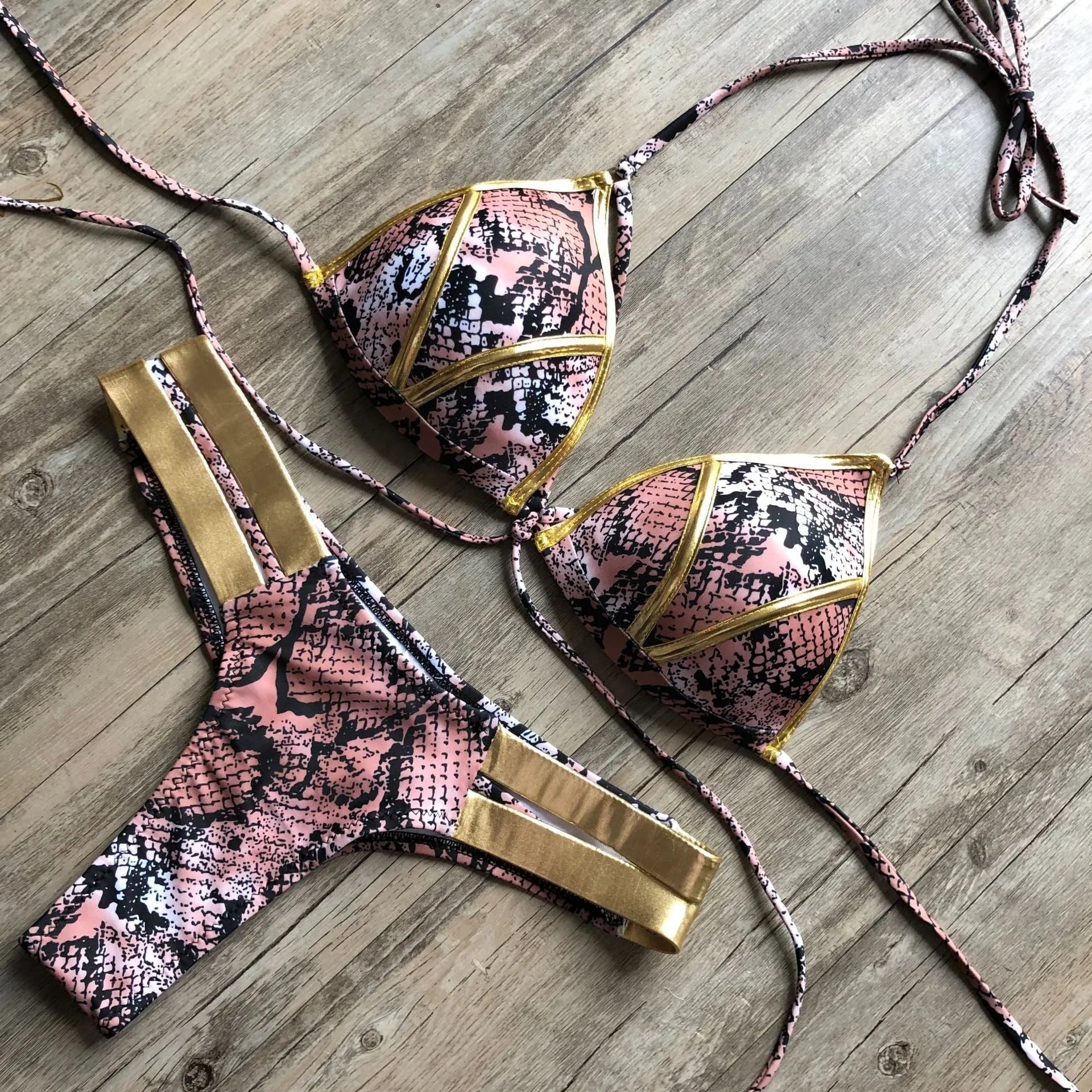 Women's bronzing bikini swimwear in multiple colours and prints for swimming.