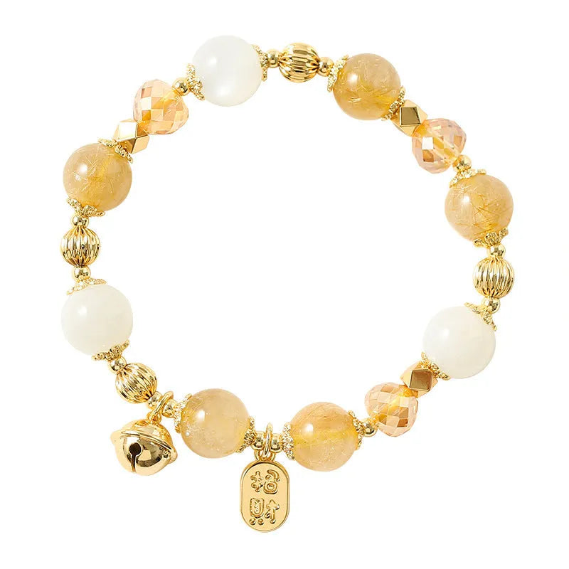 Gold tone rutilated quartz bracelet with electroplated finish and Korean style design