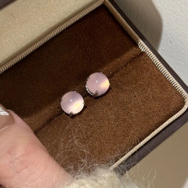 Chinese style chalcedony stud earrings with geometric design and claw setting