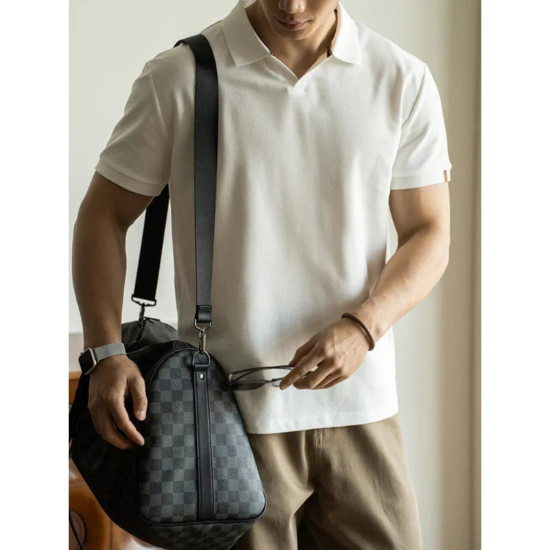 American-style short-sleeved polo shirt in blue cotton blend fabric on hanger
