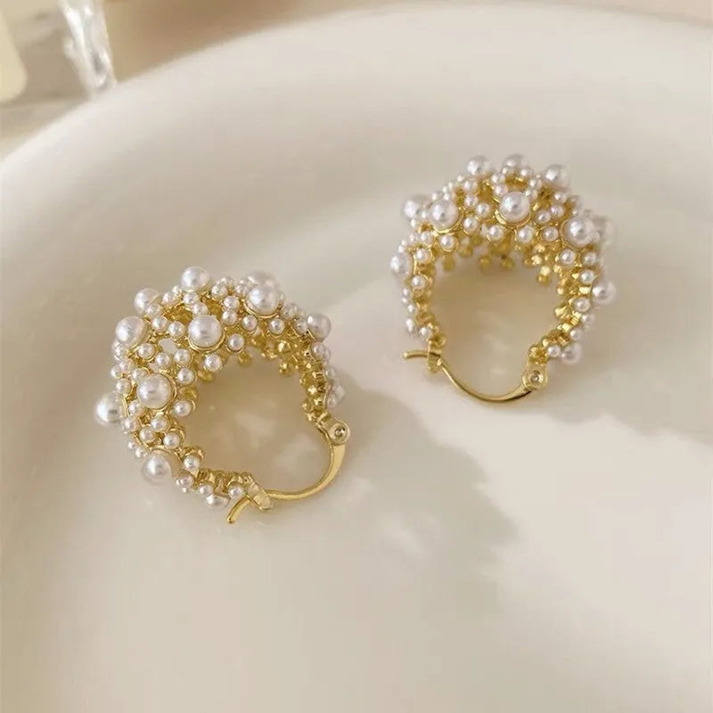 Gold copper flower basket earrings for women with pearl inlay and small bead details